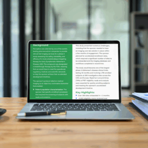 Open laptop on wooden desk displaying webpage with text on muscle, fat, and body composition changes, alongside green-highlighted expertise box.